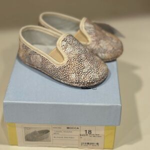 Adorable baby moccasins by Pirufin. Size 18 NWT